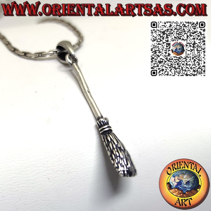Silver pendant of the witch's broom wards off negative energies