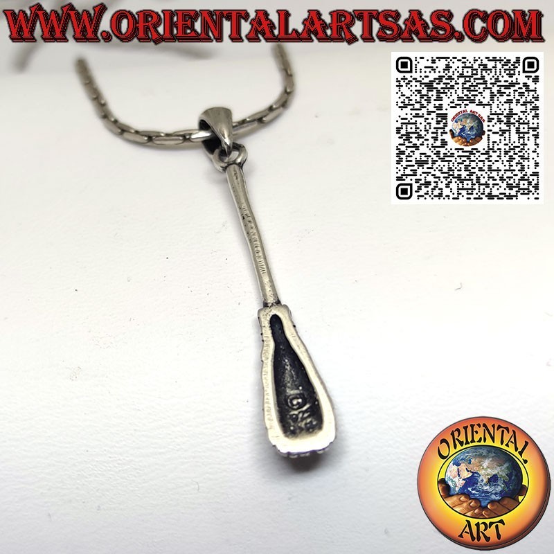Silver pendant of the witch's broom wards off negative energies