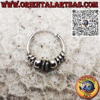 Silver earring, spiral worked circle between two 16 mm spheres