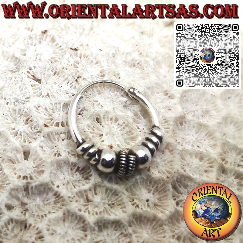 Silver earring, spiral worked circle between two 16 mm spheres