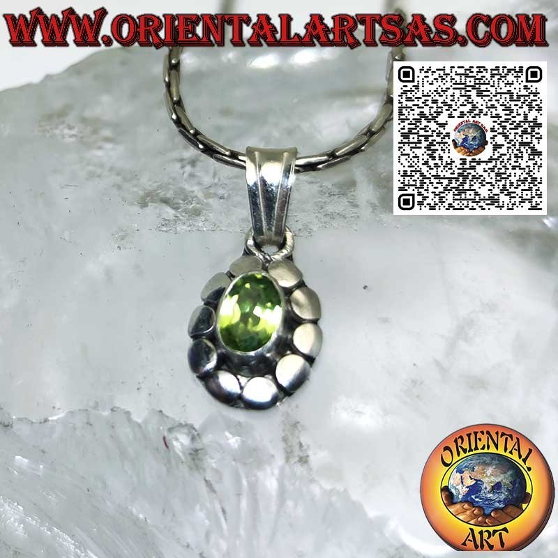 Silver pendant with natural oval peridot surrounded by studs