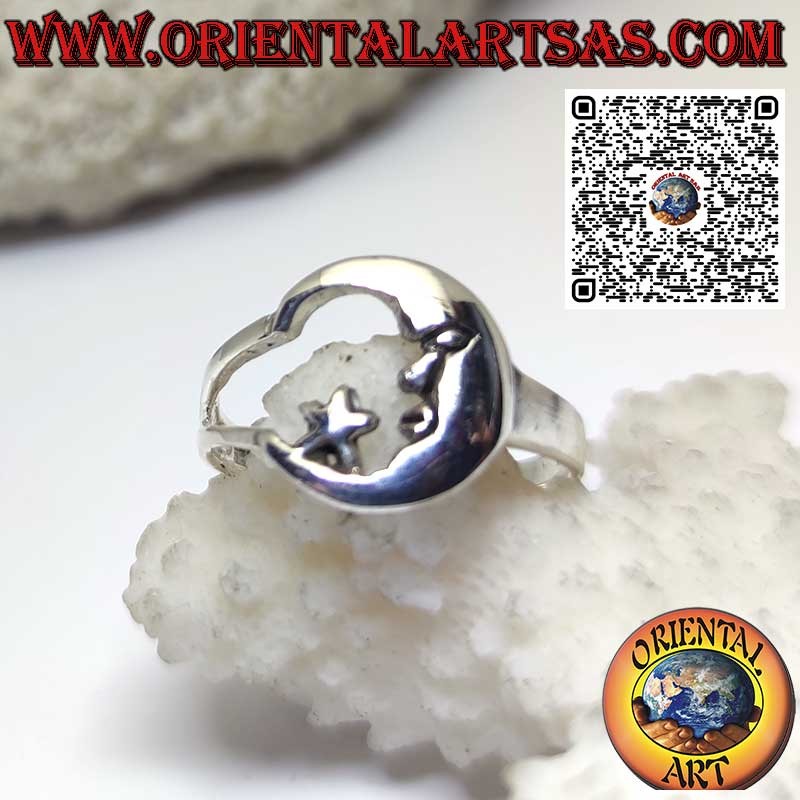 Silver ring depicting the moon with its face looking at the star