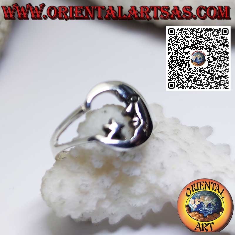 Anillo de plata que representa la luna con la cara mirando a la estrella.