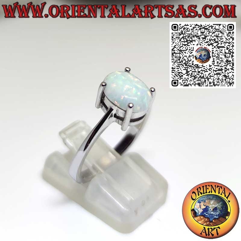 Silver ring with oval harlequin opal set with 4 prongs