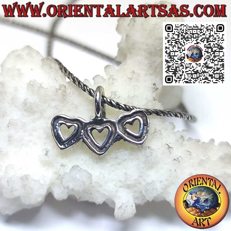 Silver pendant, trio of hearts