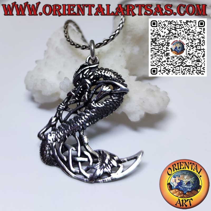 Pendentif en argent, dragon torsadé sur lune celtique