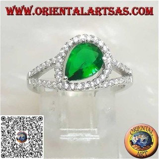 Silver ring with synthetic cross drop emerald set surrounded by zircons