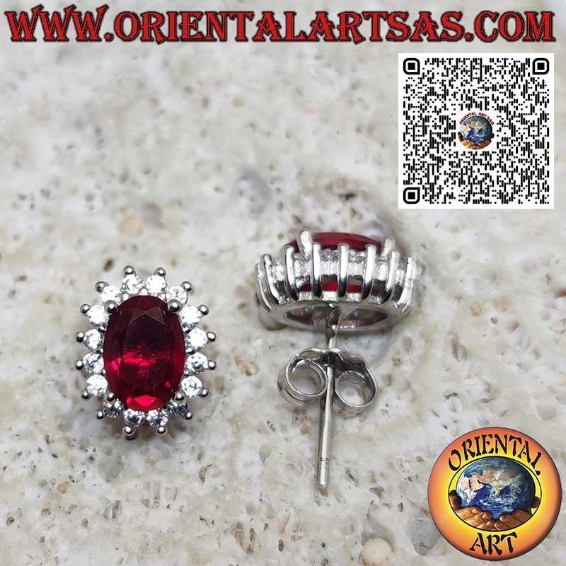 Silver lobe earrings with oval garnet surrounded by zirconia. small