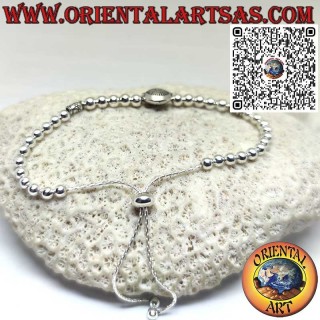 Silver bracelet with spheres and central sun with sliding ball closure