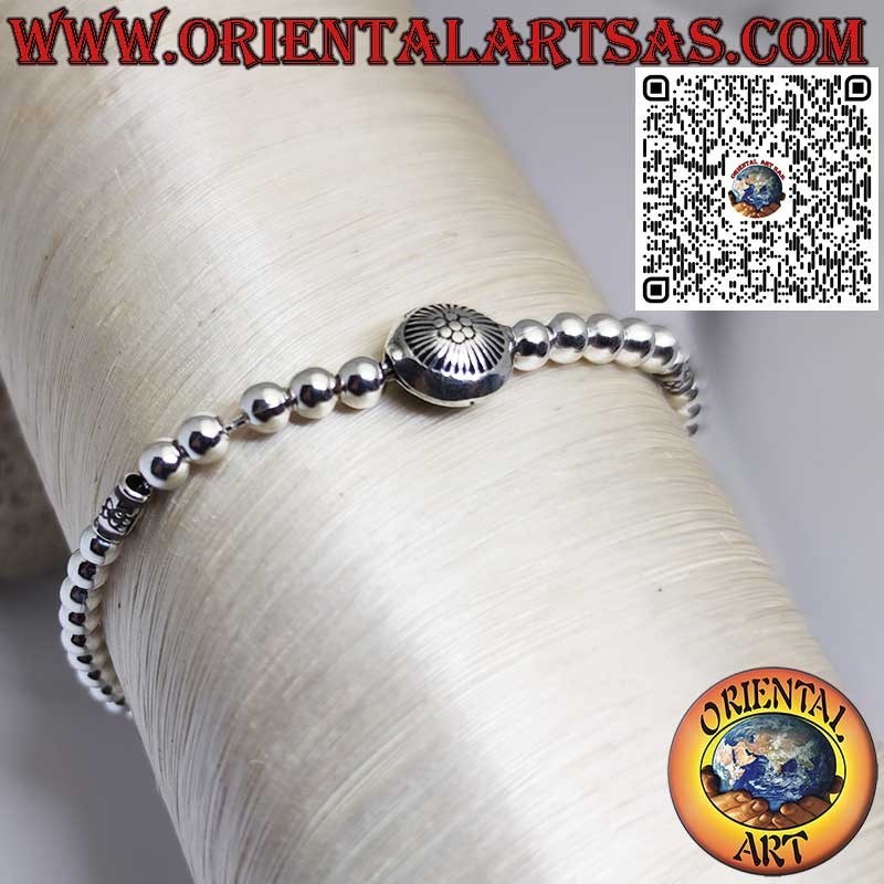Silver bracelet with spheres and central sun with sliding ball closure