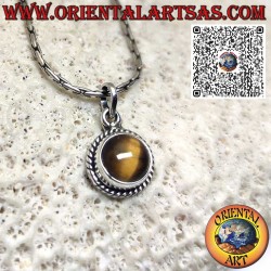 Round silver pendant with a tiger's eye surrounded by braid