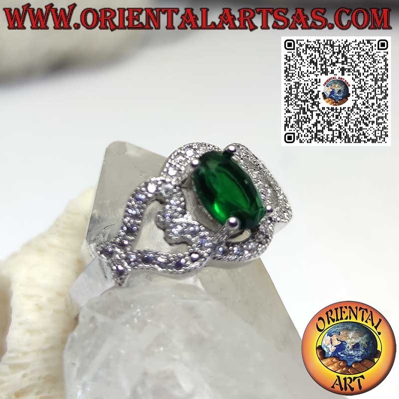 Silver ring with an oval synthetic emerald set with hearts on the sides, encrusted with zircons