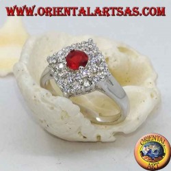 Bague en argent avec rubis rond synthétique sertie de zirocones losanges