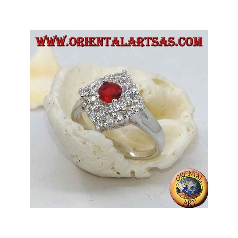 Anello in argento con rubino tondo sintetico incastonato contornato da ziroconi a rombo