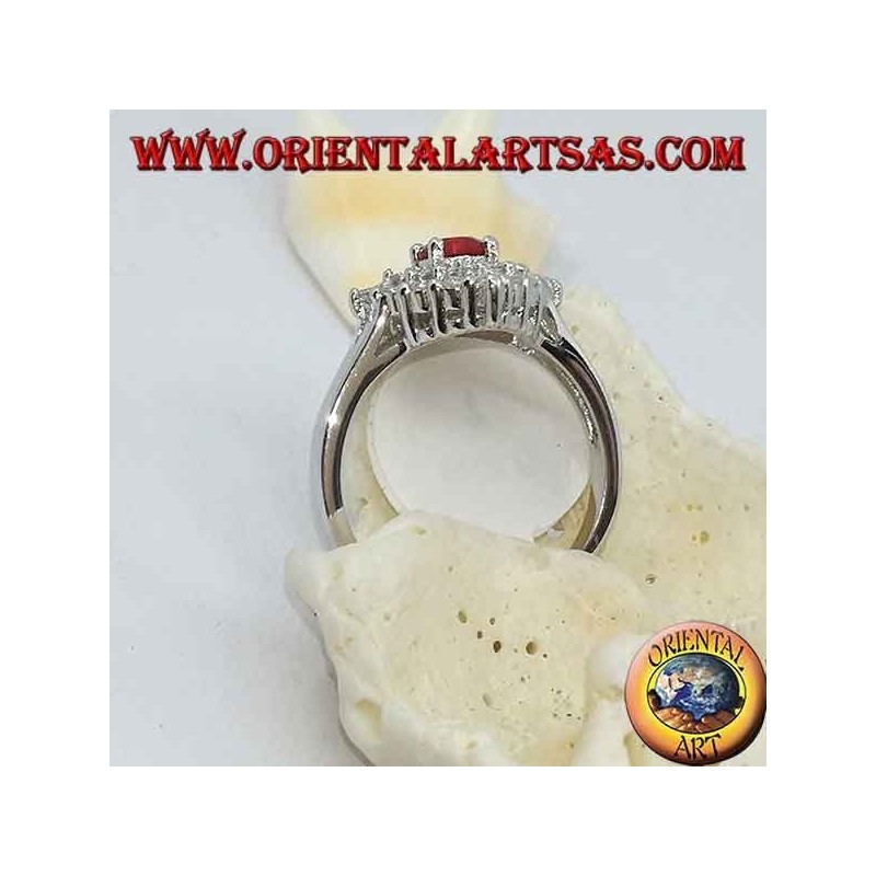 Bague en argent avec rubis rond synthétique sertie de zirocones losanges