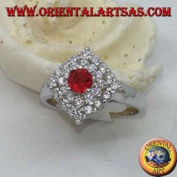 Bague en argent avec rubis rond synthétique sertie de zirocones losanges