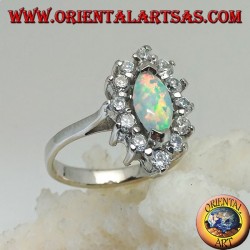 Silberring mit Shuttle-Harlekin-Opal an den Spitzen, umgeben von Zirkonen