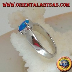 Silver ring with oval blue opal set and bow setting