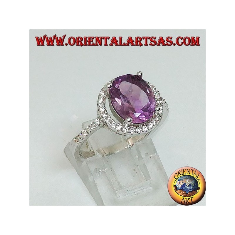 Bague en argent avec améthyste naturelle suspendue à un cercle de zircons