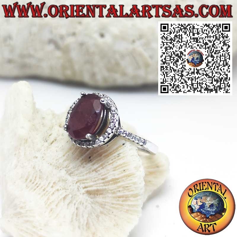 Silberring mit natürlichem Granat, schwebend auf einem Kreis aus Zirkonia