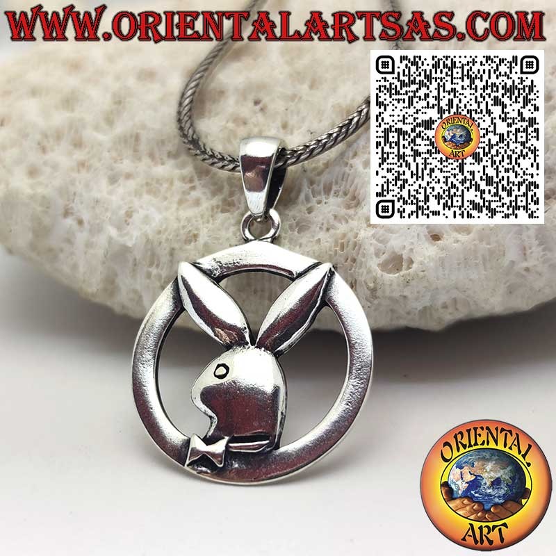 Silver pendant in the shape of a "playboy" bunny in the circle