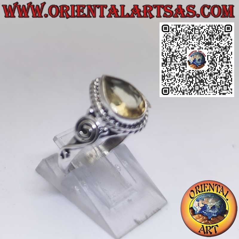 Anello in argento con topazio giallo naturale a goccia e spirale laterale