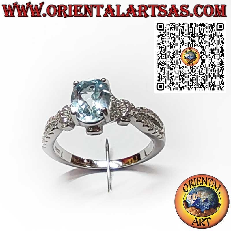 Anillo de Plata 925 con Topacio Azul Ovalado y Circonitas Laterales