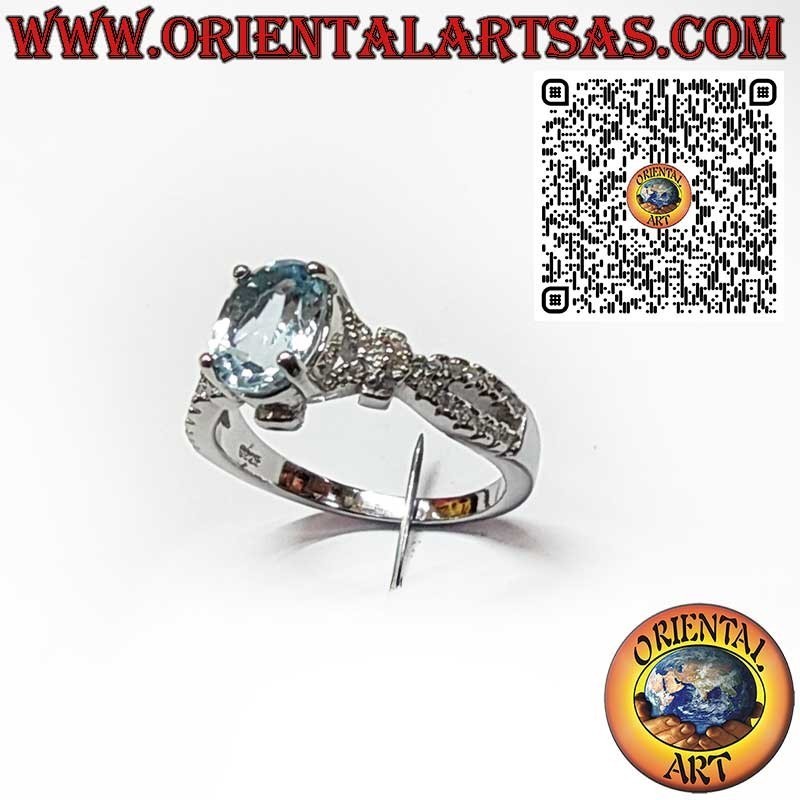 Anillo de Plata 925 con Topacio Azul Ovalado y Circonitas Laterales