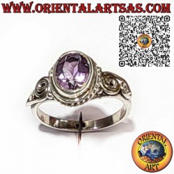 Silver ring with oval amethyst and braided design.