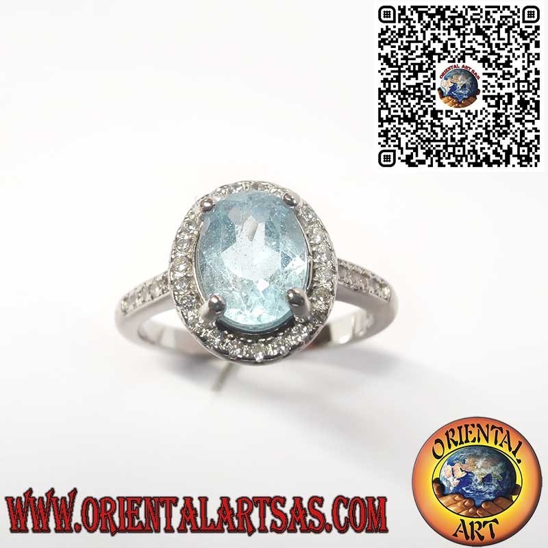 925er Silberring mit Natürlichem Ovalem Blauen Topas und Zirkonia-Rahmen