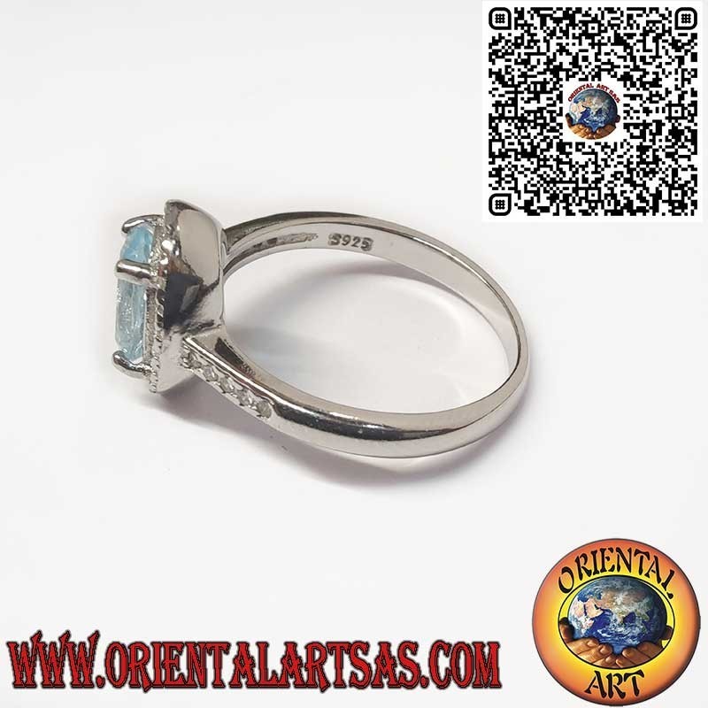 925 Sterling Silver Ring with Natural Oval Blue Topaz Surrounded by Zircons