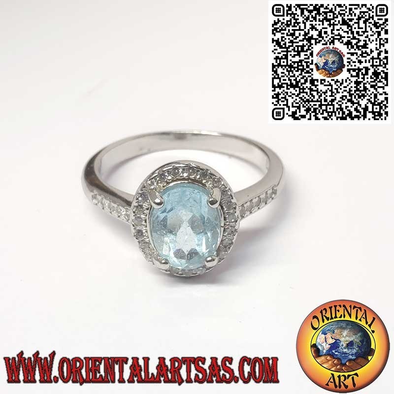 Anillo de Plata 925 con Topacio Azul Natural Ovalado Rodeado de Circonitas