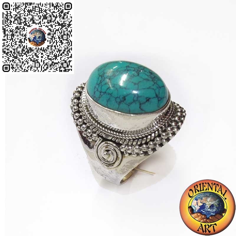 Anello in argento con turchese cabochon ornata da intreccio e spirale
