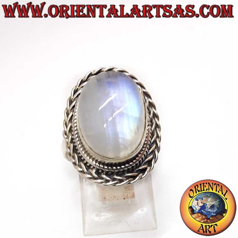 Enchanting silver ring with oval rainbow moonstone surrounded by a braid. Symbol of intuition and serenity. Frame 22x17mm, weigh