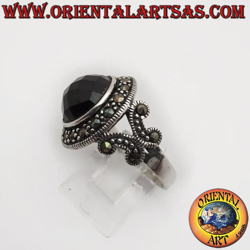 Anillo de plata 925 con ónix negro redondo facetado y marcasitas.