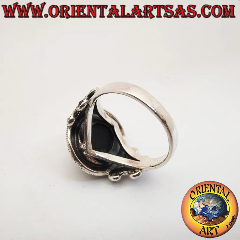 Anillo de plata 925 con ónix negro redondo facetado y marcasitas.