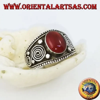 Handcrafted 925 sterling silver Balinese ring featuring oval carnelian gem and double side spirals