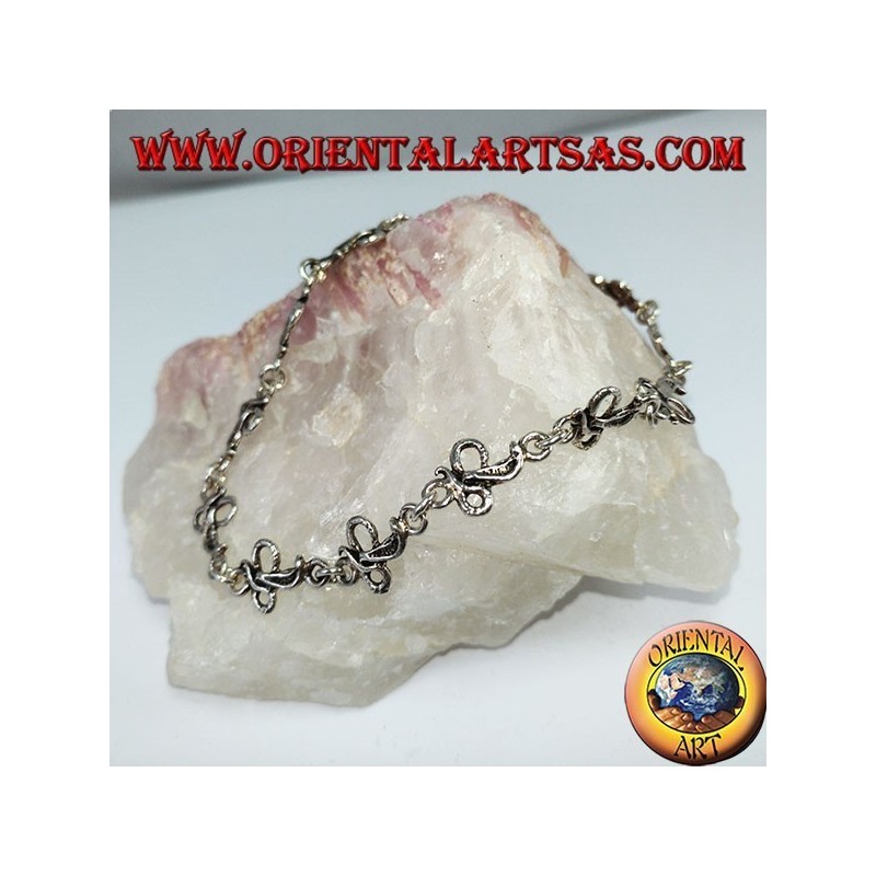 Silver bracelet with 12 cobra