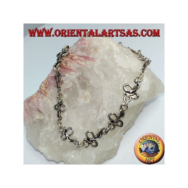 Bracciale in argento con 12 cobra