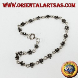 Silver bracelet with 20 double-sided flowers