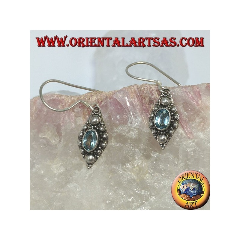 Silver earrings with natural blue Topaz