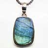 P. en argent avec  étoile noire, labradorite